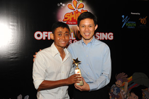 Salihin is pictured with Major-General (NS) Chan Chun Sing, from whom he received the award